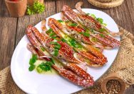 Hidangan Kepiting Segar ala Kungfu Live Seafood Market yang diolah dengan bumbu rempah Nusantara, menjaga cita rasa khas laut yang lezat dan menggugah selera."