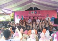 Tim penilai dan kader kesehatan Desa Karang Tengah Kecamatan Pagedangan berfoto bersama seusai penilaian Lomba Revitalisasi Gerakan Sayang Ibu Tingkat Kabupaten Tangerang 2025 di Balai Desa Karang Tengah.